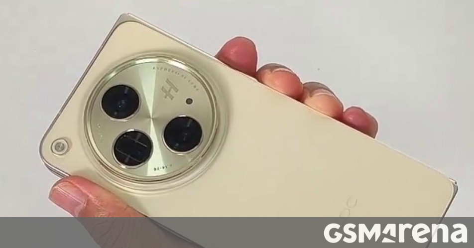 Oppo Find N3 gold model poses for the camera ahead of launch